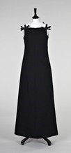 Lot 109 - An André Courrèges classic black evening gown,...
