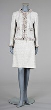 Lot 160 - A Chanel tweed suit, 2005, labelled, of white,...