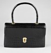 Lot 17 - A fine Hermès black crocodile handbag, 1960s,...
