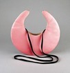 Lot 15 - A Pierre Cardin pink satin crescent bag, 1980s,...