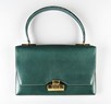 Lot 12 - An Hermès forest-green leather handbag, early...