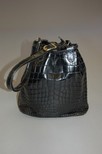 Lot 2 - An Aspreys black crocodile duffle bag,...