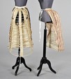 Lot 28 - Five cage-form bustles, late 1860s -1880s,...