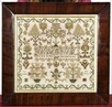 Lot 215 - An embroidered sampler by Ann Spencer, circa...