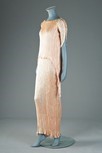 Lot 47 - A fine Mariano Fortuny Peplos gown, circa 1920,...