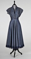 Lot 51 - A Schiaparelli blue tulle dinner gown and...