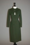 Lot 55 - A Jean Patou olive-green wool day dress, circa...