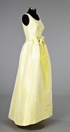 Lot 69 - A Cristobal Balenciaga primrose yellow silk...