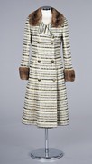 Lot 86 - A Pierre Balmain striped metallic evening coat,...