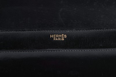 Lot 83 - An Hermès black box leather handbag, circa...