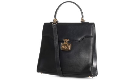 Lot 76 - A Gucci black leather handbag, probably 1980s,...