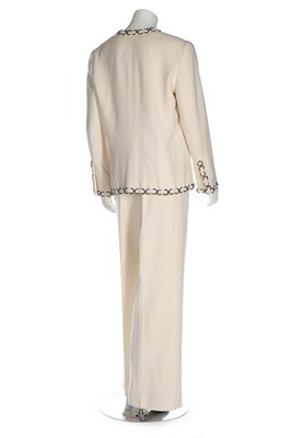 Lot 1 - A Chanel white silk tweed suit, 2002, labelled...