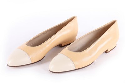 Lot 201 - A pair of Chanel two-tone pumps, modern, of...