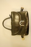Lot 22 - A Delvaux black leather handbag, late...