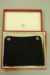 Lot 27 - A Cartier Ltd, London black grosgrain...