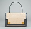 Lot 9 - An Hermès canvas and black leather `Piano'...