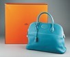 Lot 25 - An Hermès denim blue `Bolide' handbag, modern,...