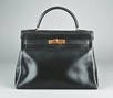 Lot 17 - An Hermès `soft' black leather Kelly bag,...