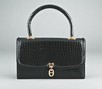 Lot 8 - An Hermès black crocodile handbag, pre 1970,...