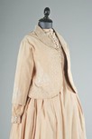 Lot 65 - A beige holland linen walking ensemble, late...