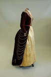 Lot 59 - A wine velvet and gold brocaded satin ball...