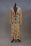 Lot 80 - A tapelace coat, circa 1910-12, the design of...