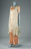 Lot 76 - A Mariano Fortuny apricot silk Peplos gown and...