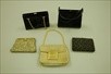 Lot 131 - Four bags, comprising: a 1930s gold brocaded...