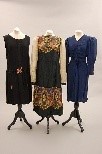 Lot 98 - A group of day and dinner wear dating from the...