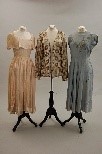 Lot 102 - A large group of day and dinner wear, late...