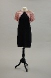 Lot 170 - A Donald Brooks pink and black cocktail gown,...