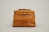 Lot 130 - An Hermès tan leather Kelly bag, 1970s-80s,...