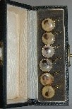 Lot 201 - A cased set of `Gaiety Girl' buttons, circa...
