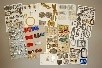 Lot 203 - A group of buckles and hat pins, mounted onto...
