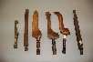 Lot 256 - Six carved wooden knitting sheaths, 19th-early...