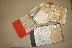 Lot 258 - Three folders of interesting braids, lace,...