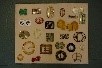 Lot 237 - A display board of assorted buckles, various...