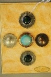 Lot 239 - Five rare Arts & Crafts `The Guild' buttons,...