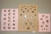Lot 242 - Three display cards mounted with mainly...