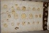 Lot 246 - A good display card of ivory and bone buttons,...
