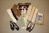 Lot 263 - A group of gloves, shoes, related literature,...
