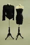 Lot 149 - An Herve Leger black elastane stretch sheath...