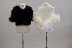 Lot 153 - A Saks Fifth Avenue white cockerel feather...