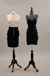Lot 30 - An Hervé Leger black elastane dress, 1990,...