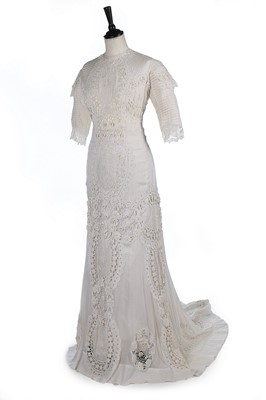 Lot 171 - A whitework embroidered and lace inset summer...