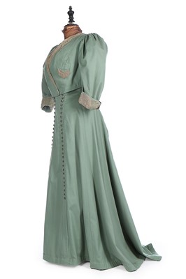 Lot 177 - A blue-green wool walking ensemble, circa 1900,...