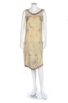 Lot 195 - A pale pink chiffon cocktail dress, circa 1929,...