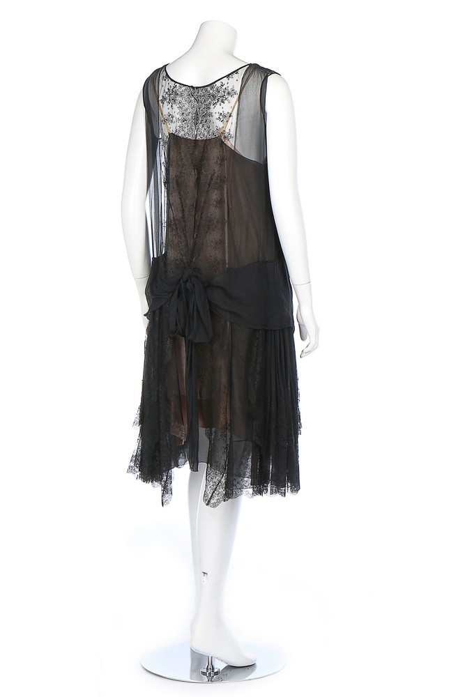 Lot 199 - A beaded dark brown/black satin flapper