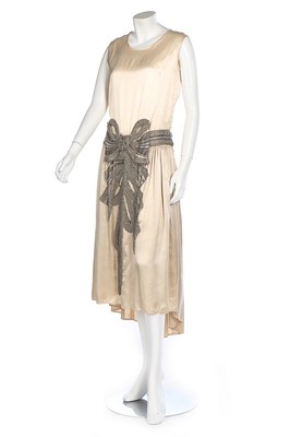 Lot 209 - A Margaret Marks beaded satin bridal gown,...