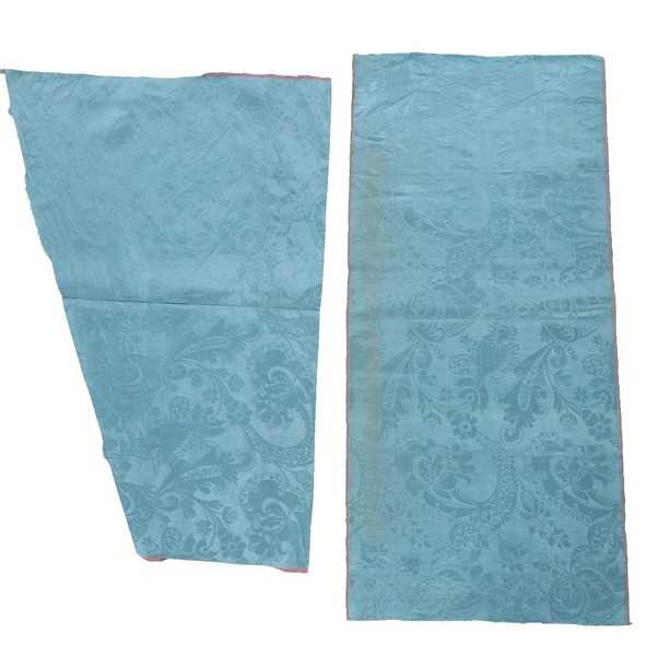 Lot 64 - An un-picked blue damask satin open robe or...